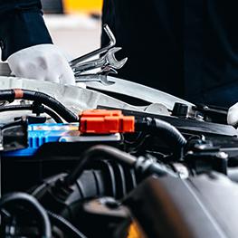 A mechanic working on a car